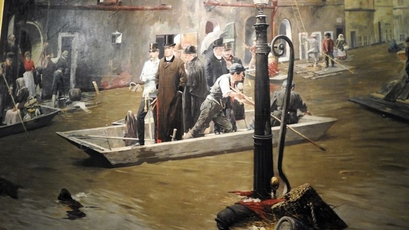 J. Douba: Místodržící hrabě František Thun na pramici v Josefově při povodni v roce 1890