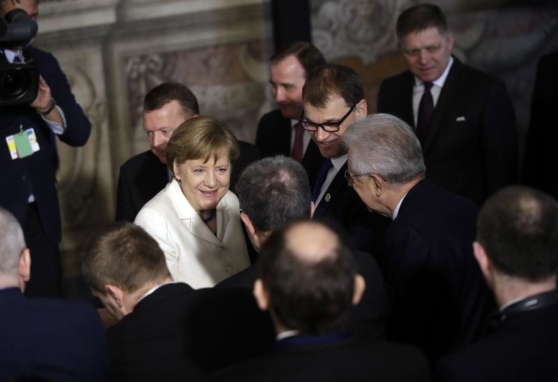 Německá kancléřka Angela Merkelová se vítá s dalšími evropskými představiteli v Palazzo dei Conservatori.