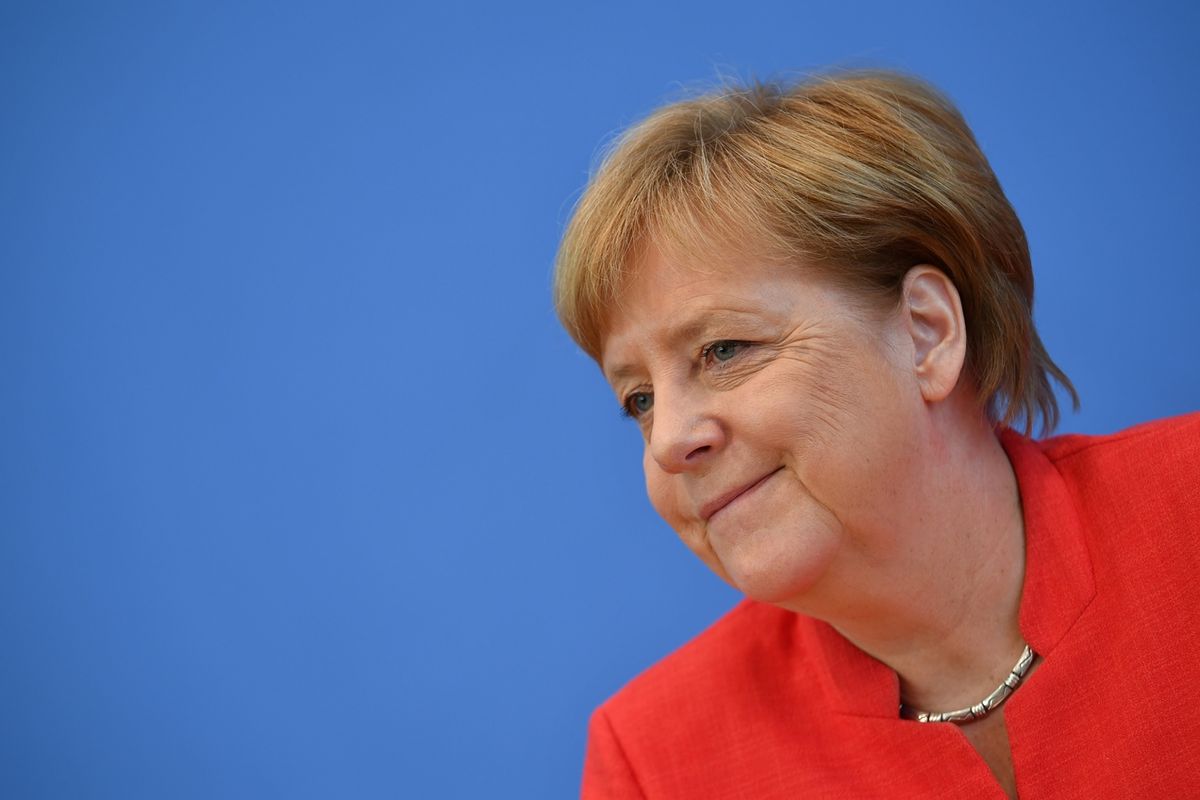 Německá kancléřka Angela Merkelová během páteční tiskové konference.