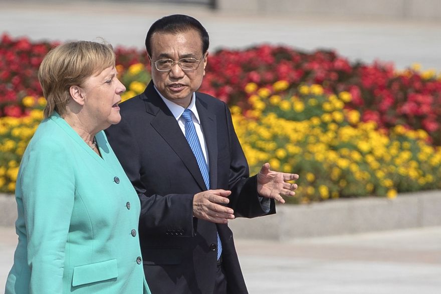 Německá kancléřka Angela Merkelová na nedávné návštěvě Číny, kde ji přivítal čínský premiér Li Kche-čchiang