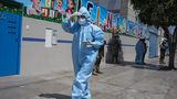 Koronavirus se bude vracet jako sezónní nemoc, varují Číňané