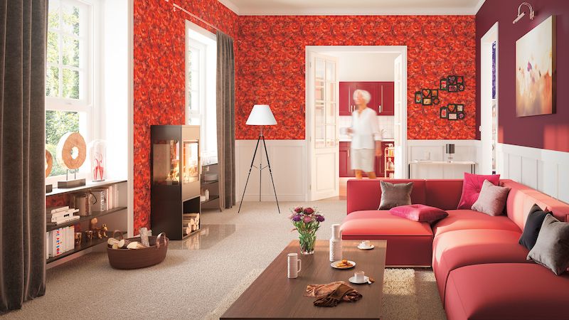 Hřejivý a útulný interiér ve stylu Magic Moments. Převládá sytě rudá, mahagonově hnědá a červená. Pohodlí doladí polštáře, závěsy a rámové obrazy. 
