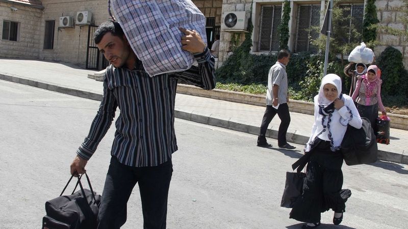 Syřané, kteří utekli do Libanonu přes přechod Masnaa