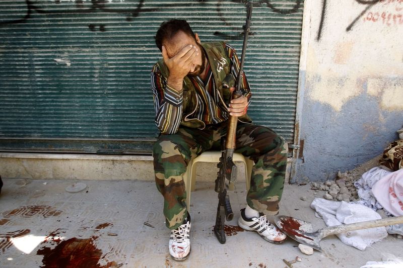 Povstalecký bojovník v syrském Halabu