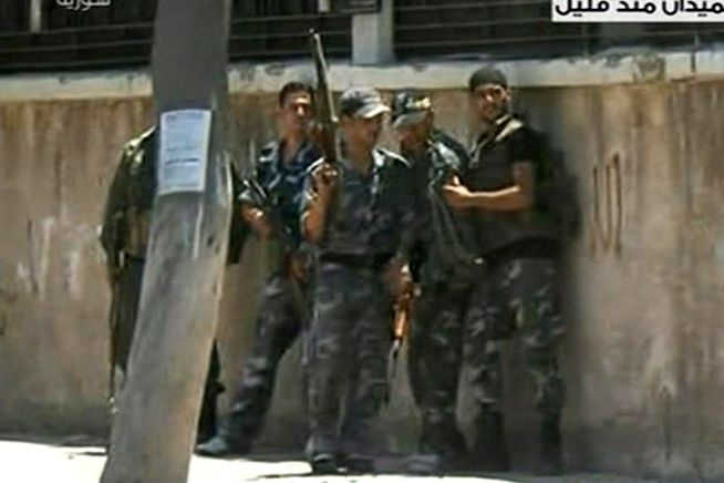 Syrští vojáci v ulicích Damašku
