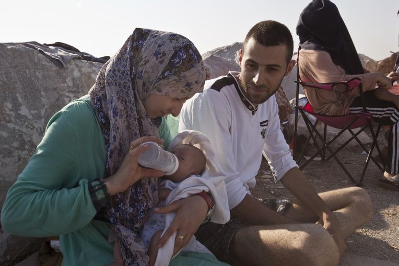 Syrská rodina, které se podařilo dostat se na řecký ostrov Lesbos. 