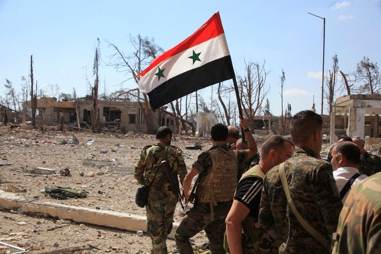 Syrské vládní síly v dobyté oblasti Aleppa