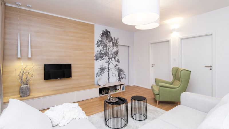 Malá změna dispozice byt provzdušnila, obývací pokoj je nyní prostornější.
