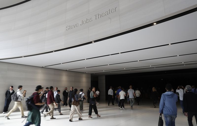 People await the start of a product launch event at Apple's new campus in CupertinoPeople enter the Steve Jobs Theater before the start of a product launch event at Apple's new campus in Cupertino, California, U.S. September 12, 2017. REUTERS/Stephen Lam