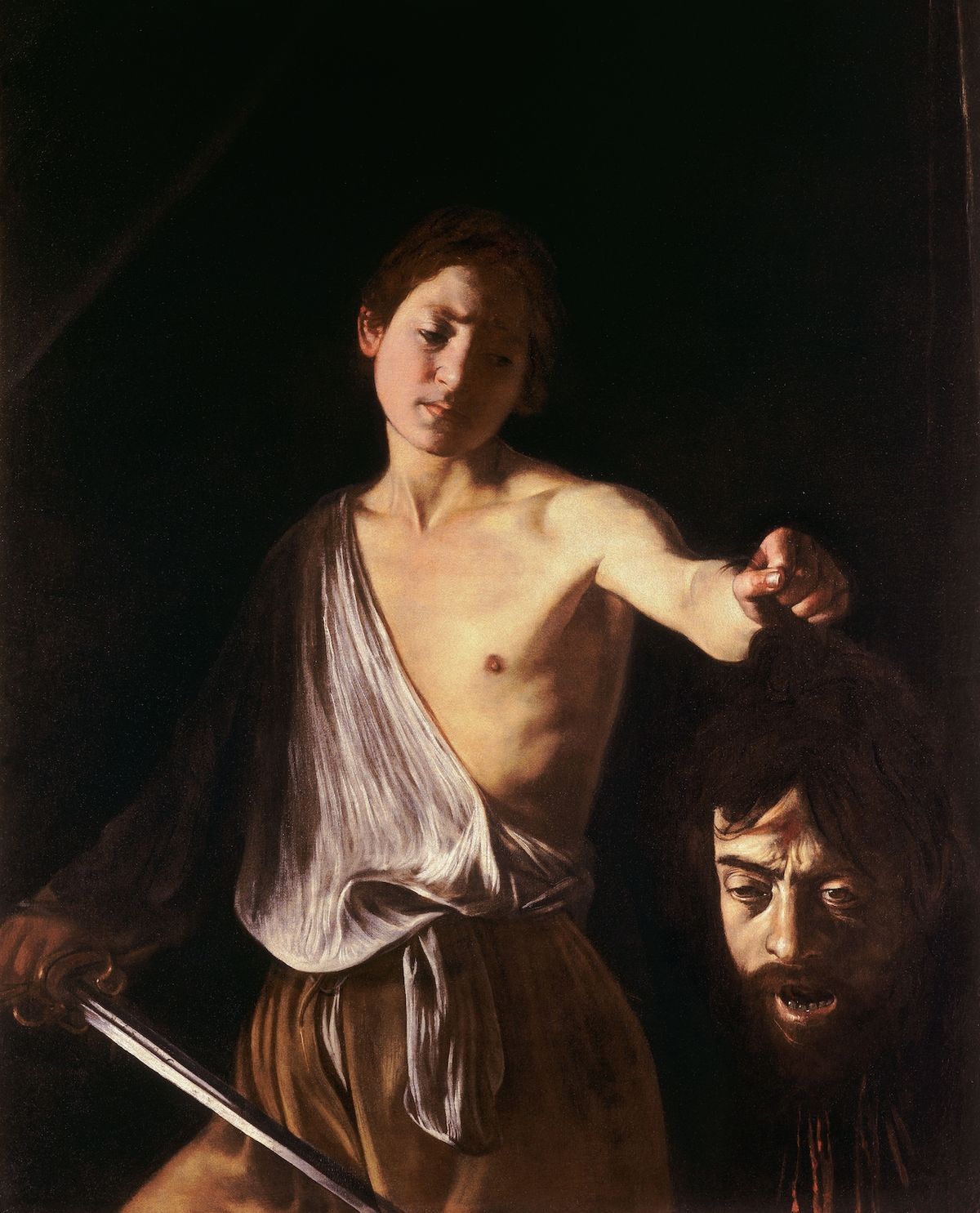 Caravaggio: David s hlavou Goliáše (1610)