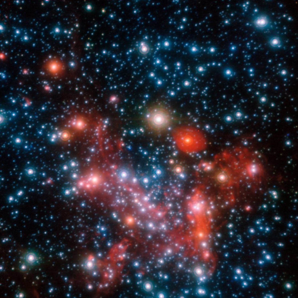 Snímek centrální části Mléčné dráhy, jak vypadá v oblasti blízké infračervenému záření. Sledováním pohybů centrálních hvězd za více než 16 let byli astronomové schopni určit hmotnost supermasivní černé díry, která se zde ukrývá.