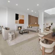 V obývacím pokoji laděném do světlých zemitých barev nechybí krb