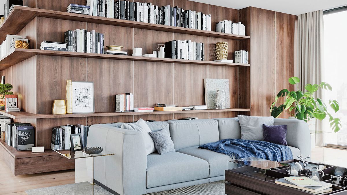 Atypická knihovna s dokonalým využitím stěn a rohu v obývacím pokoji. 