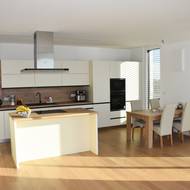 Soukromý byt investora je zařízen v nadčasovém stylu.