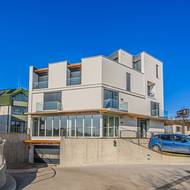 Nájemní dům je střídmou městskou stavbou. 