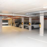 Obyvatelé mají k dispozici podzemní garáže i parkovací stání u stavby.