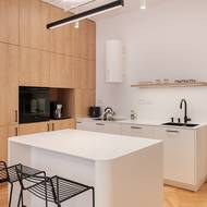 Kuchyňský ostrůvek slouží zároveň jako snídaňový bar.