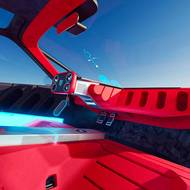 Místo klasické přihrádky je před spolujezdcem systém na uchycení různých drobností.