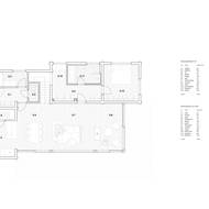 V prvním nadzemním podlaží se nachází kuchyň a s ní propojený obývací pokoj.