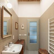 Obklady použité na fasádě architekti využili také v interiéru.