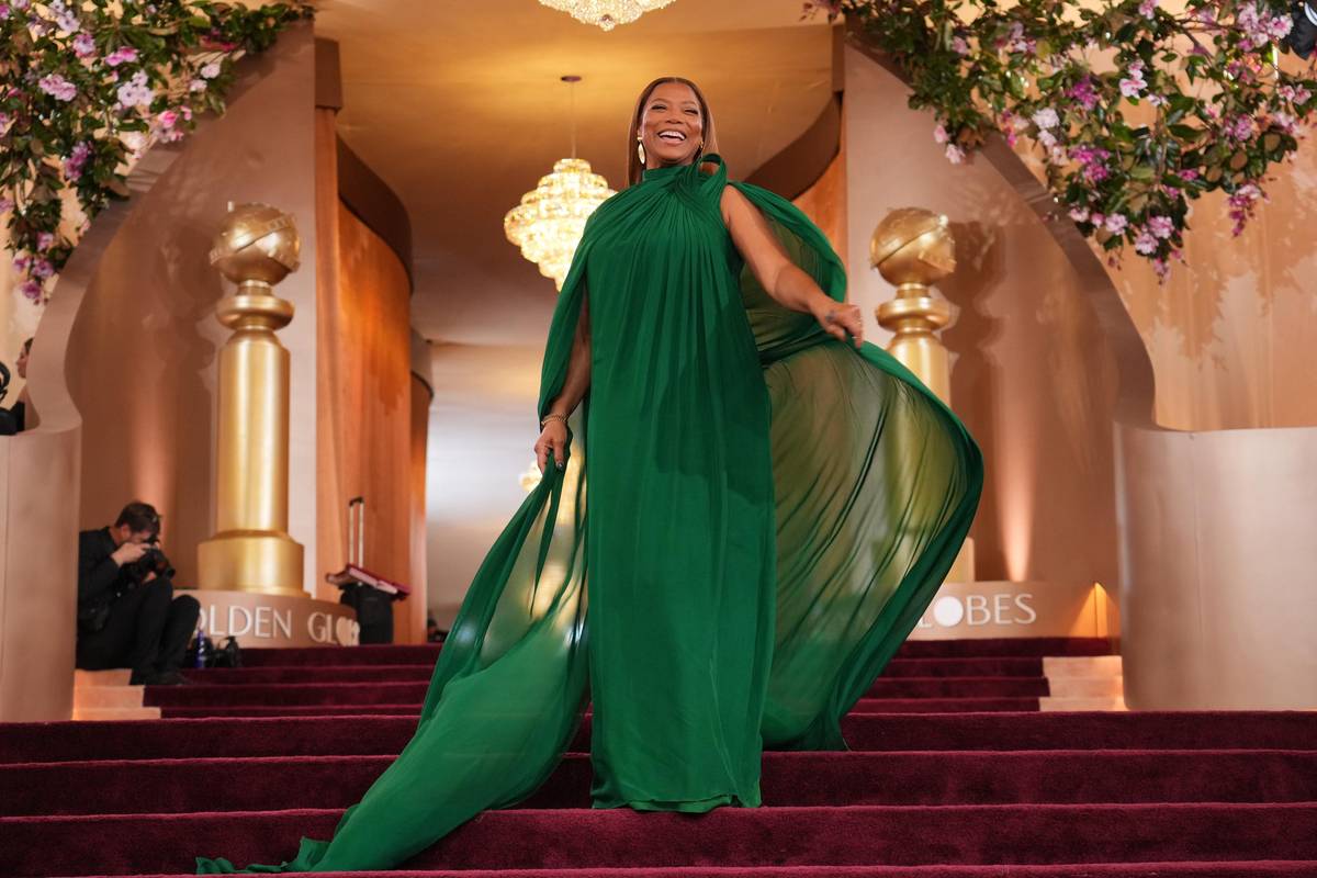 Dechberoucí šaty v lahvově zelené měla i herečka Queen Latifahová.