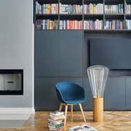 Základem zařízení obývacího pokoje bylo vytvořit spousty úložných prostorů.