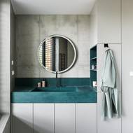 Umyvadlo ze zeleného betonu je hezkým odkazem na kuchyňský ostrůvek.