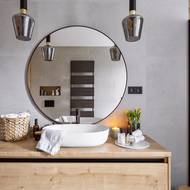 Na umyvadlovou skříňku byl použit stejný materiál jako na kuchyň. 