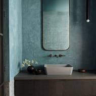 Tlumené barvy dávají zajímavý kontrast k nadzemním patrům, kde naopak převládají ty světlé. 