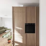 Do centrálního boxu jsou na straně kuchyně chytře umístěné některé spotřebiče.