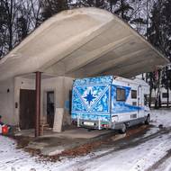 Bývalá benzinová stanice v Milíně z roku 1959. Od roku 2016 je chráněna jako nemovitá kulturní památka České republiky.