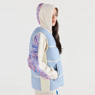 Mikina a vesta pro francouzské sportovkyně v pastelových barvách značky Le Coq Sportif.