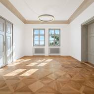 Základní prvky interiéru bytu jsou skvěle sladěné.