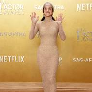 Chase Infiniti ve flitrových šatech od Louis Vuittona