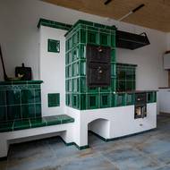 Kachlová pec byla prvkem, který si majitelé vysnili hned na začátku.