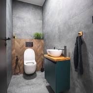 Celý interiér si majitelka sladila do hořčicově smaragdové barvy, a to včetně samostatné toalety u předsíně.