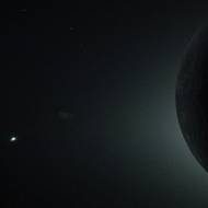 Měsíc, když zcela zakrývá slunce. Na jeho horizontu lze vidět tzv. Moře nepokojů, které je viditelné i ze Země. „Záblesk“ vlevo je planeta Venuše.