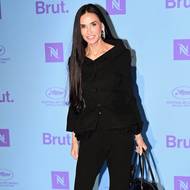 Na party Nespresso x Brut se Moore objevila v černých capri kalhotách a saku s peplum volánem značky Magda Butrym.