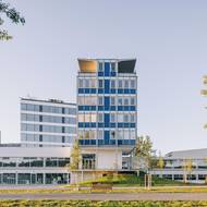 Panelárna v bruselském stylu je inspirativní retro stavbou, která našla nové využití a slouží jako kreativní, komunitní a společenský prostor.