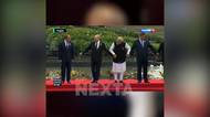 Putin při focení na summitu hledal lepší místo, pak zavrávoral